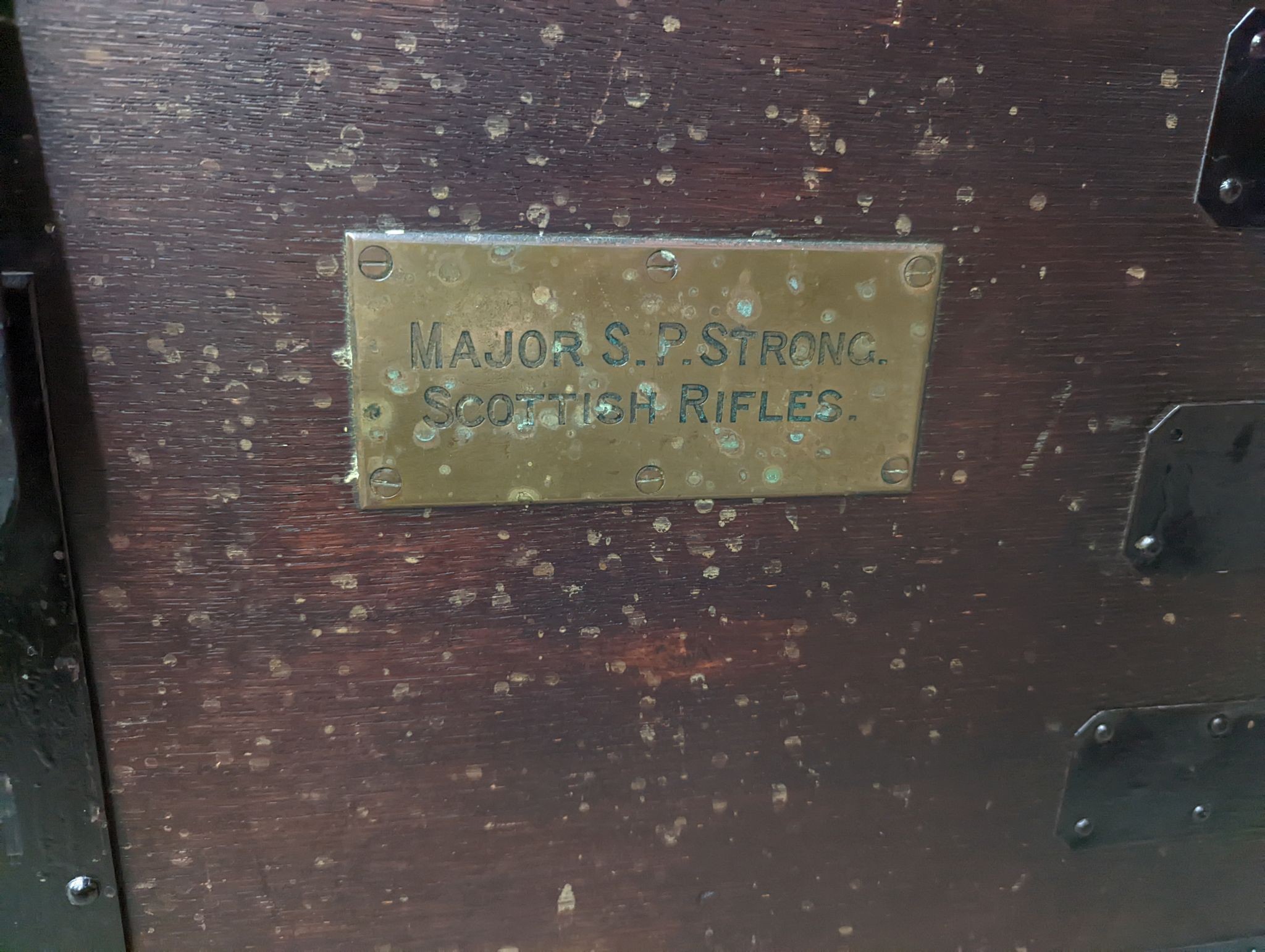 A Victorian iron bound oak silver chest, bears engraved brass plaque Major S. P. Strong, Scottish Rifles, length 82cm, depth 61cm, height 57cm